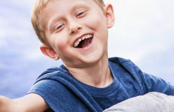 happy father playing with his little son