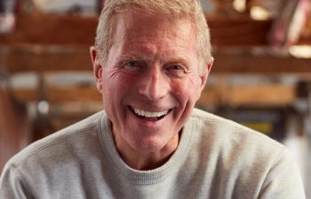 A multicultural group of school kids in a classroom