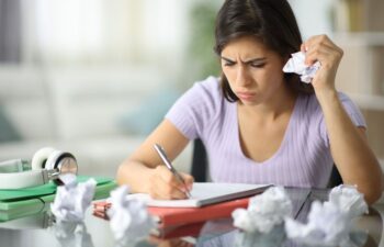 A multicultural group of school kids in a classroom