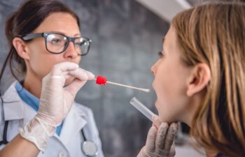 A multicultural group of school kids in a classroom